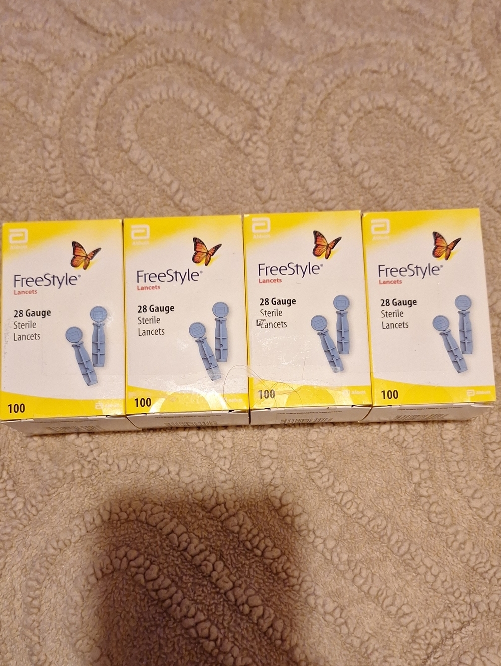 Freestyle 28 Gauge Lancets - Yellow and White Retail Boxes (4 Pack)